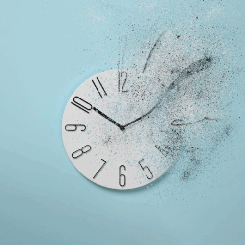 picture of a clock fading away.