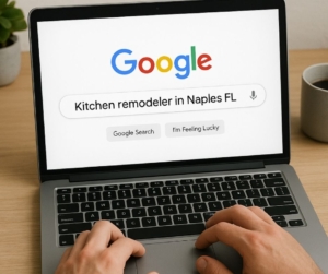 Someone types on a keyboard and does a Google search for Naples Kitchen Remodeler.