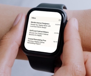 Someone checking Naples emails on smartwatch.