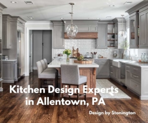 Kitchen with gray cabinets and wood floors.