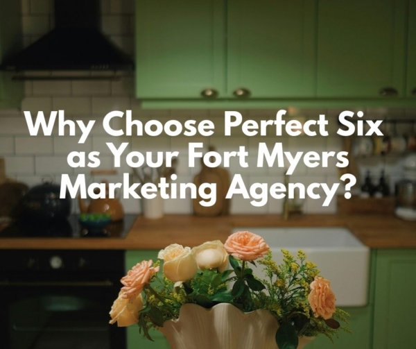 Green kitchen with pink roses to advertise Perfect Six Marketing.