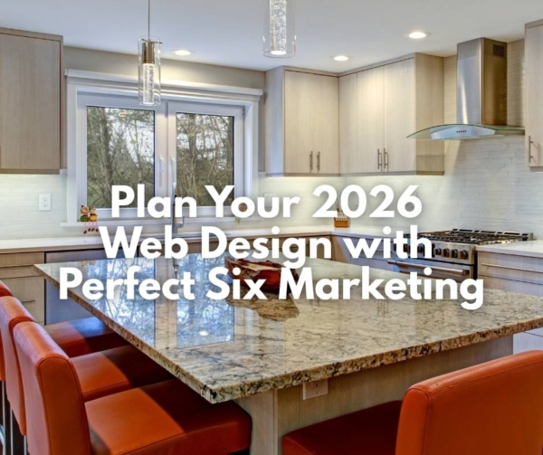 A kitchen with a large island and red chairs. Illustrates web design with Perfect Six Marketing.